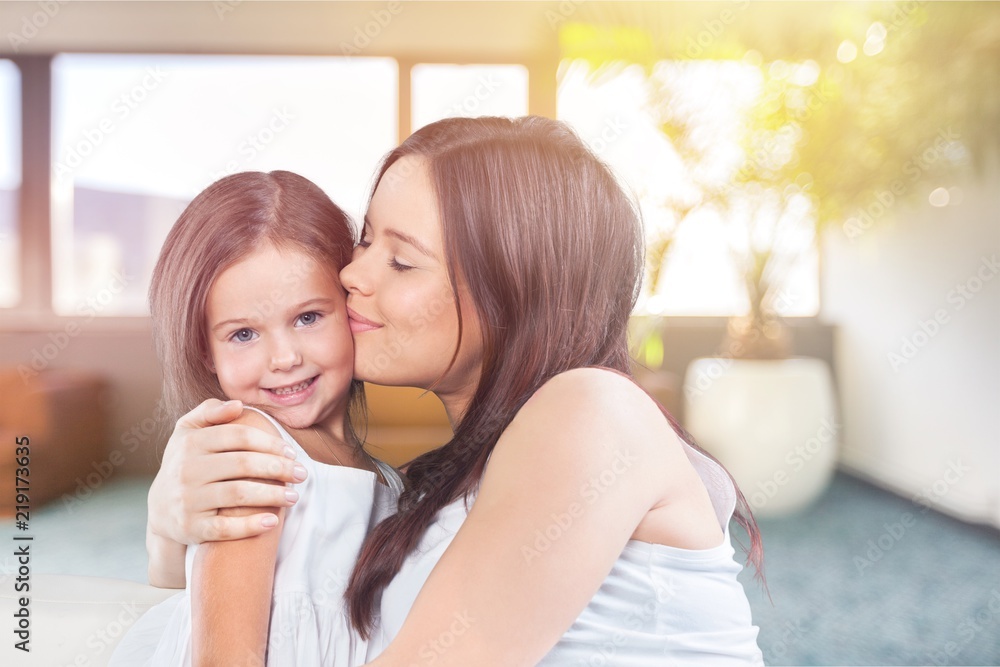 Happy Mother and daughter hugging Happy Mother and daughter hugging