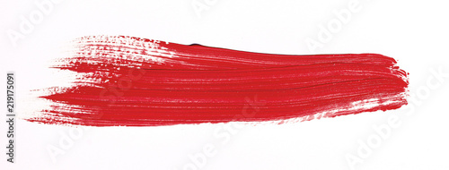 Red brush stroke isolated over white background