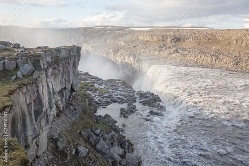 waterfall in iceland in the mountain