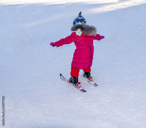 Girl learn to ski, winter, Carpathians
