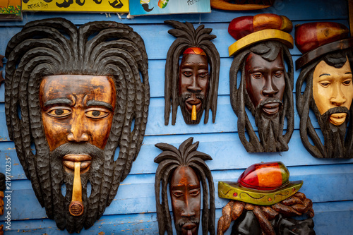 Photographie Wall art wood carvings on display for sale at a local craft market in Montego Ba