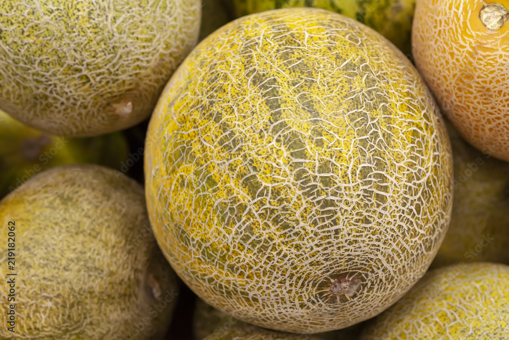 Fresh juicy melon on the counter of the store. View from above. Fresh juicy melon on the counter of the store. View from above.