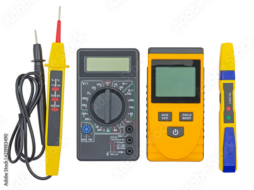 Картината върху платно voltage tester and other devices on white