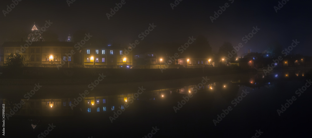 Old city of Porvoo at night in fog