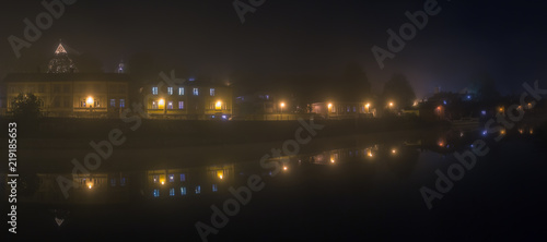 Old city of Porvoo at night in fog