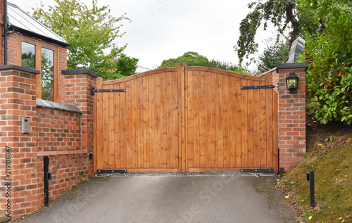 Wooden security gate with keypad lock
