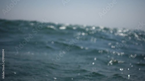First person perspective of drowning alone at sea. Thrashing and struggling to stay above the water in the middle of the ocean by yourself. Helpless and can't swim, nobody to save you.