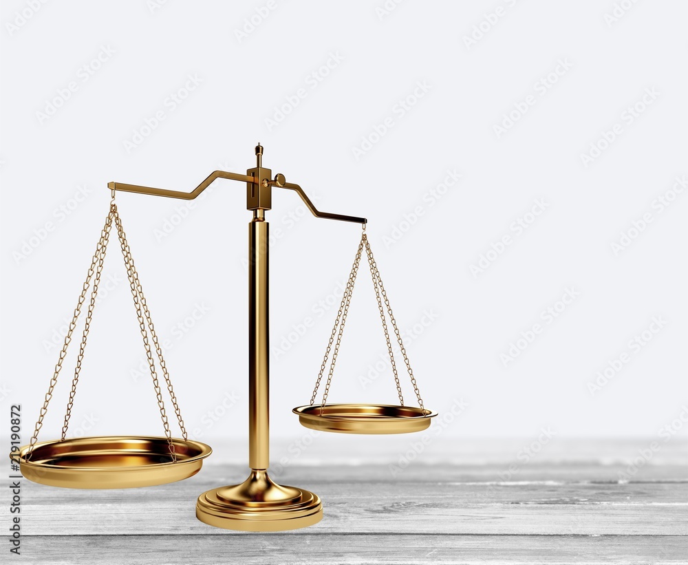 Law scales on table background. Symbol of justice Law scales on table background. Symbol of justice