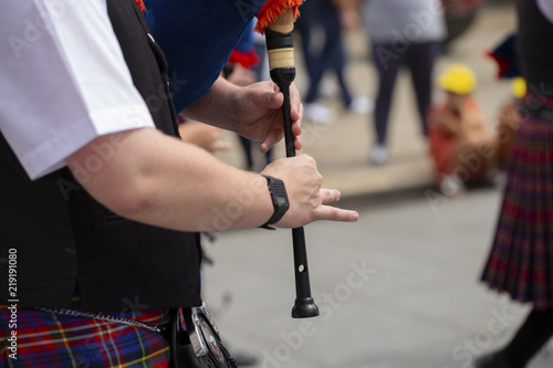 Man playing bagpipe, scottish traditional pipe band
