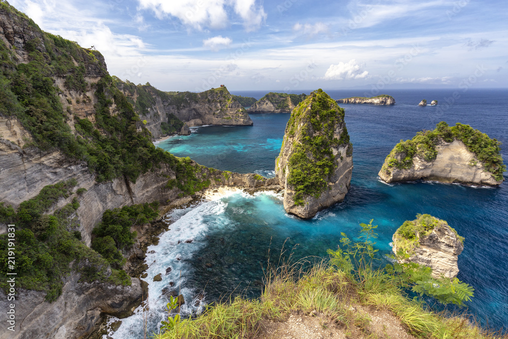 Interesting view of a collection of small islands near the Atuh Raja Lima shrine on Nusa Penida, Indonesia.