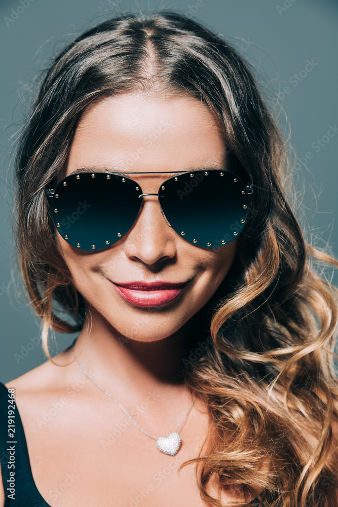 Smiling girl in sunglasses Smiling girl in sunglasses