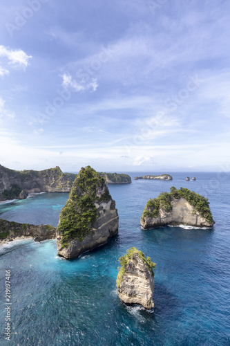 Raja Lima or Five Kings, islands off the coast of Nusa Penida near Atuh Beach.