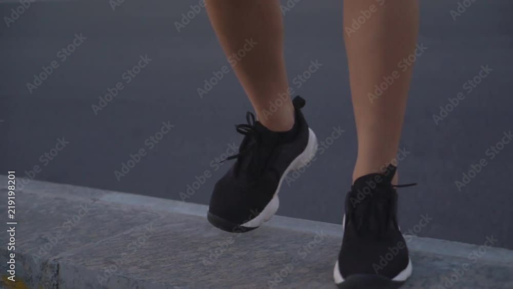 young nice teenage girl walking along the track. A brunette woman with a stitch. Attractive woman in stylish clothes. long female legs in the frame. 4K young nice teenage girl walking along the track. A brunette woman with a stitch. Attractive woman in stylish clothes. long female legs in the frame. 4K