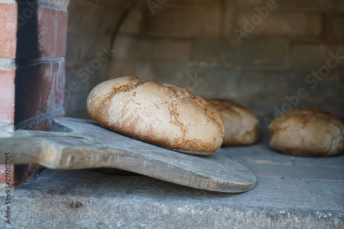Freshly baked bread baked in a wood oven according to an old recipe
