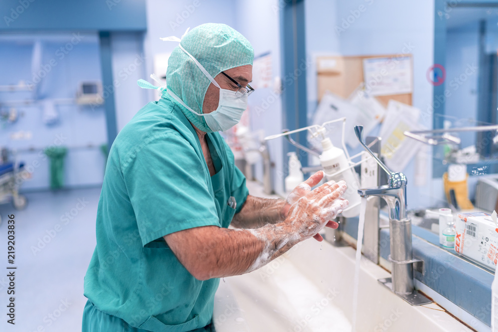 Surgeon washing his hands