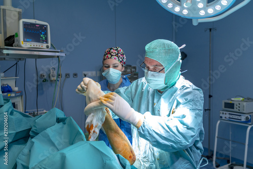 Surgeon placing a maya on the patient © JuanMiguel
