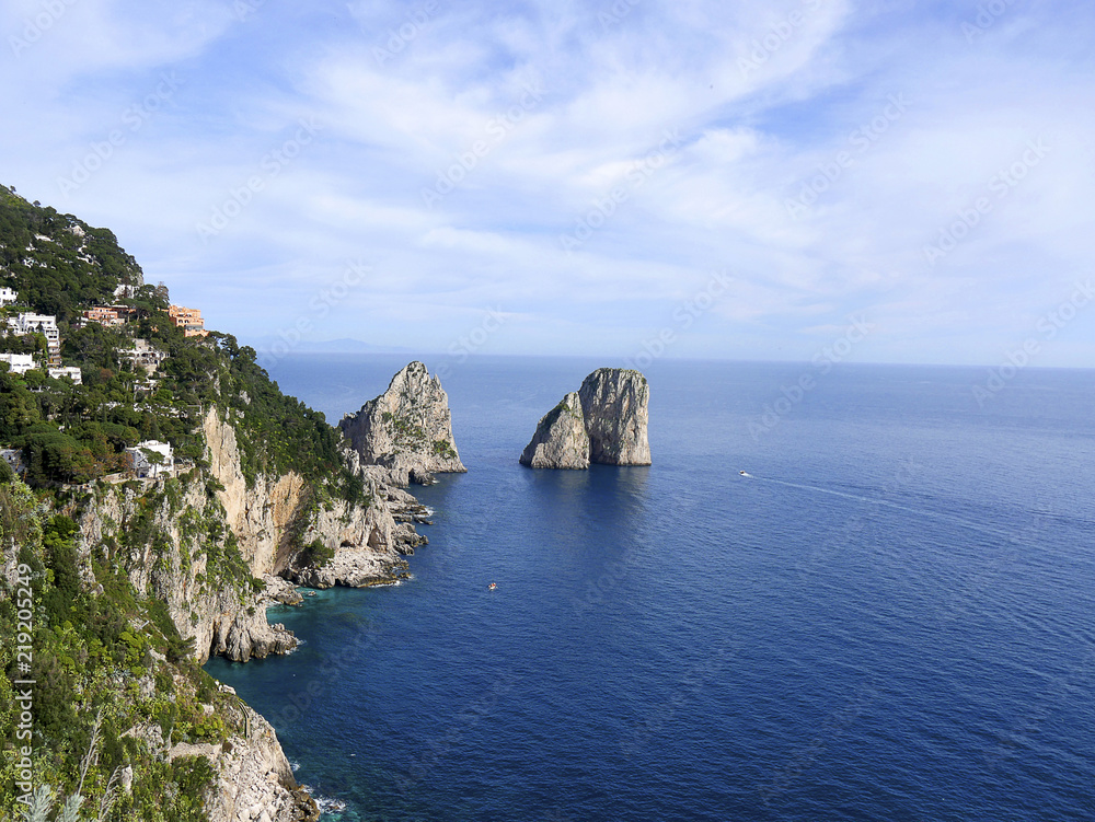 Capri is in the Bay of Naples. These are the limestone masses the Faraglioni Rocks that stand out of the sea
