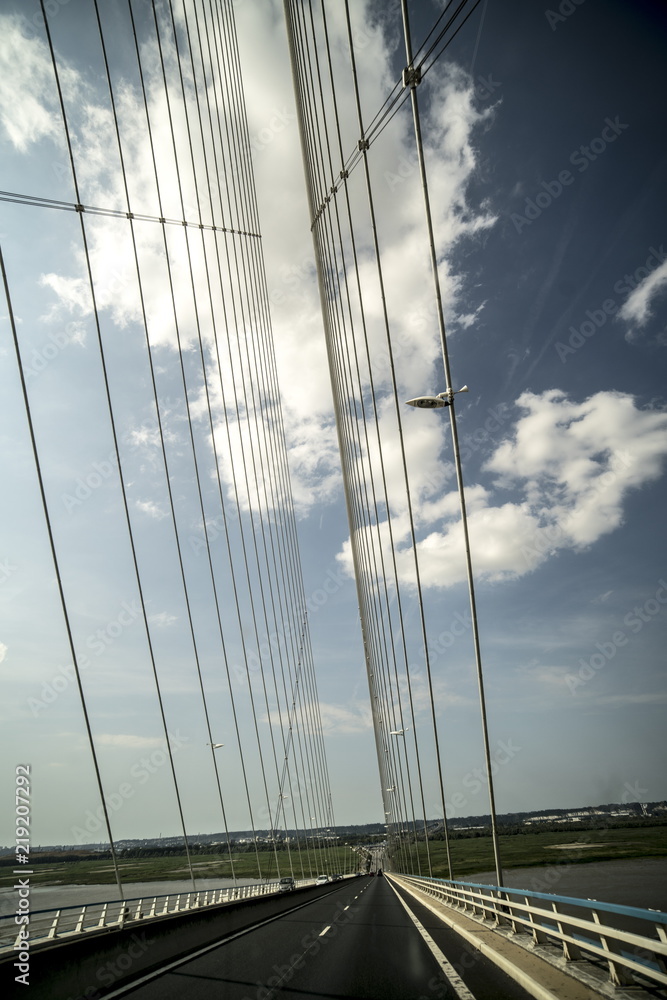 Naklejka premium bridge, sky, architecture, blue, cable, road, city, train, railway, speed, travel, rail, station, traffic, transport, night, steel, building, construction, transportation, structure, river, abstract, 