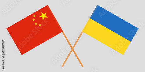 Crossed flags Ukraine and China. Official colors. Correct proportion. Vector