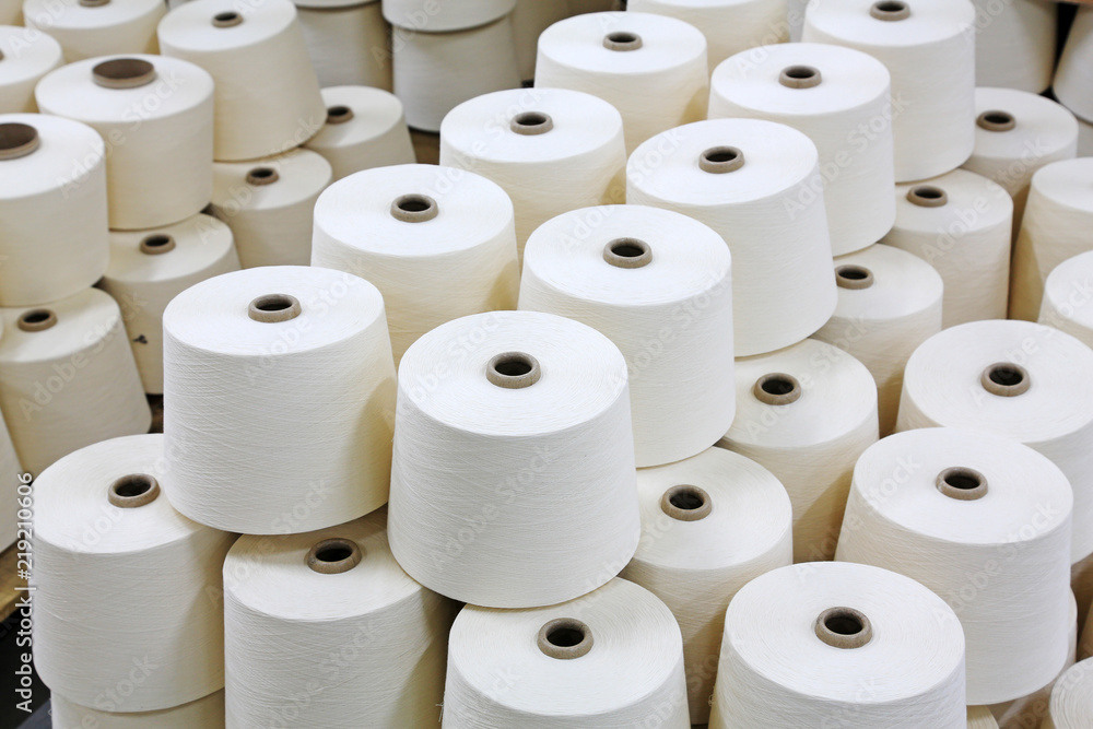 Heap together of cotton yarn in a workshop, in the ZeAo spinning LTD., on December 20, 2013, Luannan county, hebei province, China. Heap together of cotton yarn in a workshop, in the ZeAo spinning LTD., on December 20, 2013, Luannan county, hebei province, China.