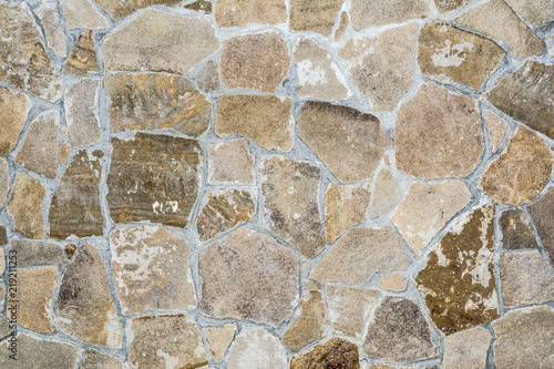 Фотография texture of an old antique stone wall, architecture abstract background