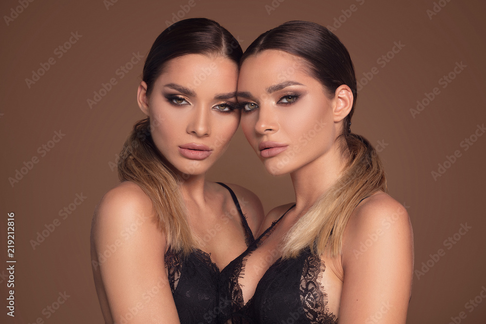 Portrait of two attractive women in glamour makeup. Portrait of two attractive women in glamour makeup.