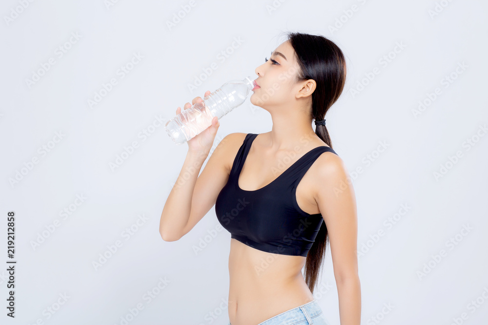 Beautiful portrait asian young woman bottle of water for healthy isolated on white background, girl with fit thirsty after exercise and fitness, health concept. Beautiful portrait asian young woman bottle of water for healthy isolated on white background, girl with fit thirsty after exercise and fitness, health concept.