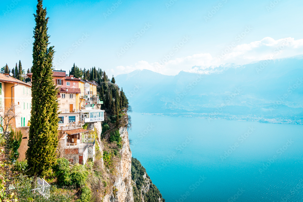 The cliffs of Tremosine sul Garda, view to the balconies at the cliffs next to the abyss, in the background Lake Garda, Italy