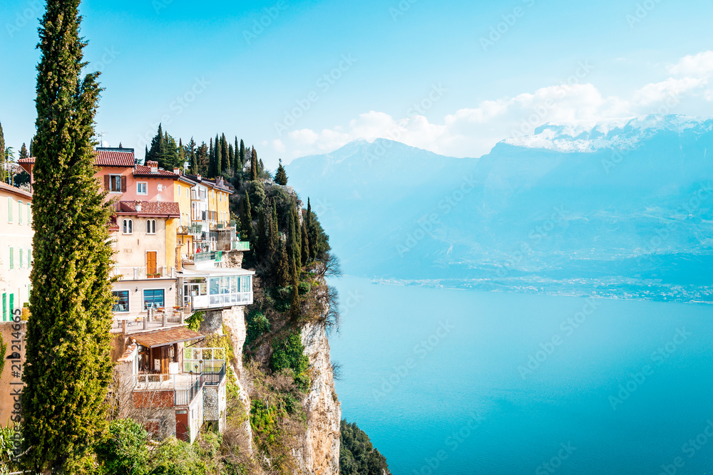 The cliffs of Tremosine sul Garda, view to the balconies at the cliffs next to the abyss, in the background Lake Garda, Italy
