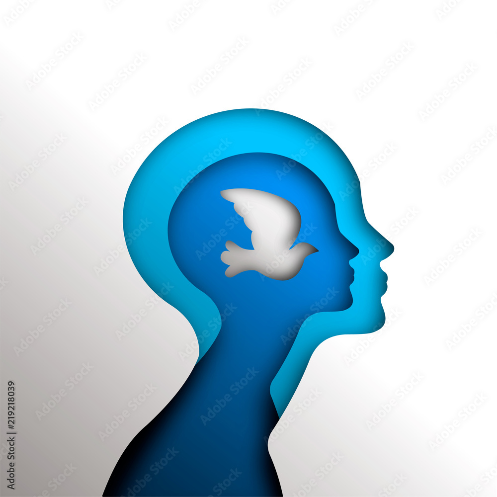 Paper cutout head with dove bird for mind freedom Paper cutout head with dove bird for mind freedom