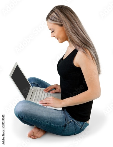 Young cute woman with laptop isolated on white background