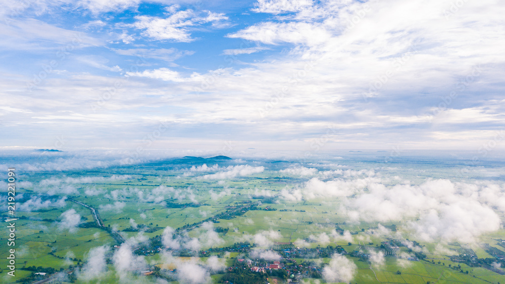 Fototapeta premium Aerial view of Cloudy sky high above the earth