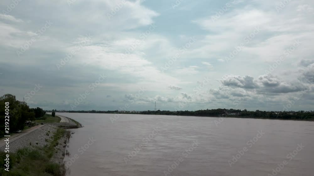 NONG KHAI, THAILAND - CIRCA AUGUST 2018 : View of THAI-LAO FRIENDSHIP BRIDGE and MEKONG RIVER. NONG KHAI, THAILAND - CIRCA AUGUST 2018 : View of THAI-LAO FRIENDSHIP BRIDGE and MEKONG RIVER.