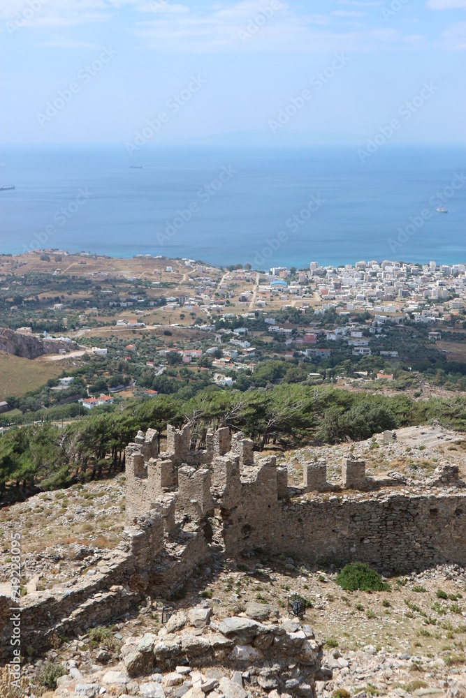 View to Karystos and Mediterranean sea from byzantine castle Castello Rosso, island of Evia, Greece