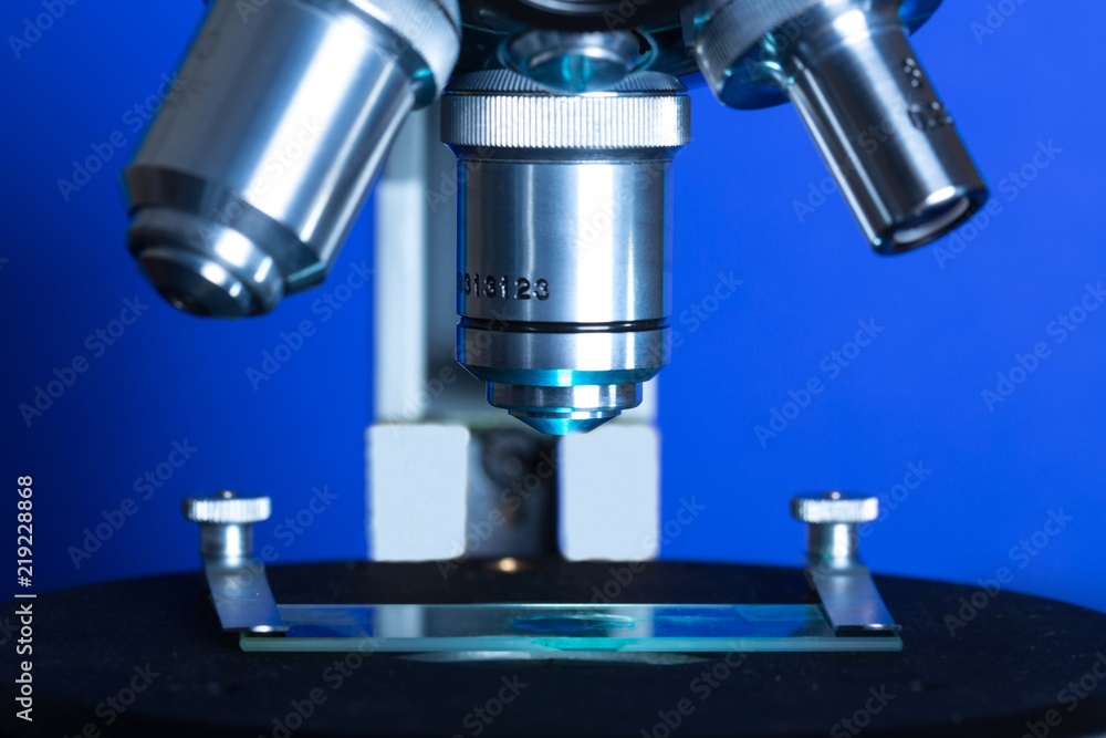 Closeup of Microscope Lenses and Slide Closeup of Microscope Lenses and Slide