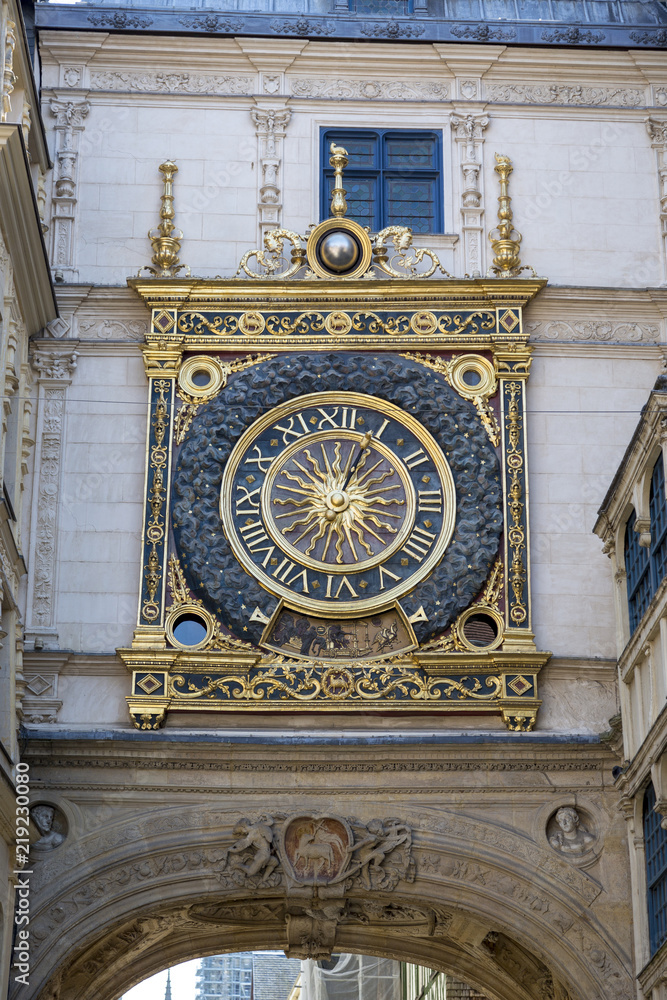 Astronomical clock of the XIV century over the arch in the center of Rouen in France