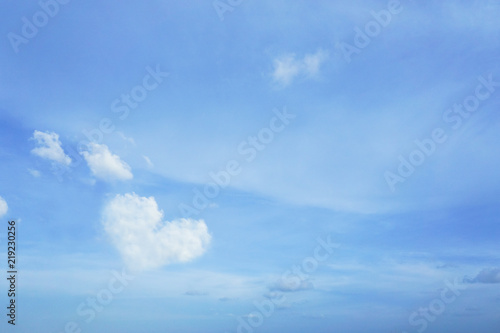 Cloud in heart shape on blue sky.