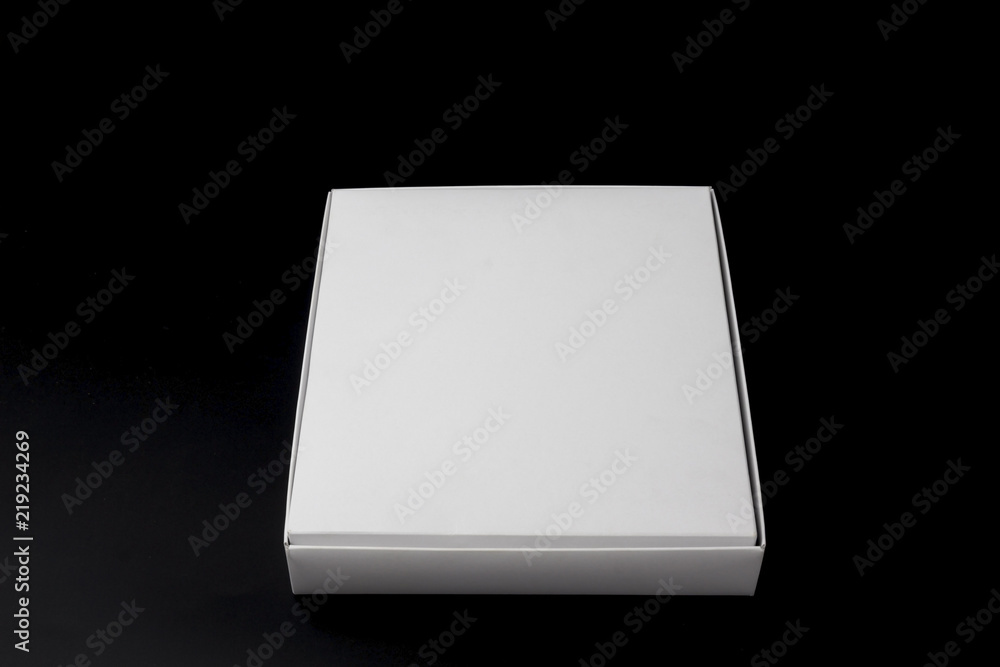 white box isolated on black background close up white box isolated on black background close up