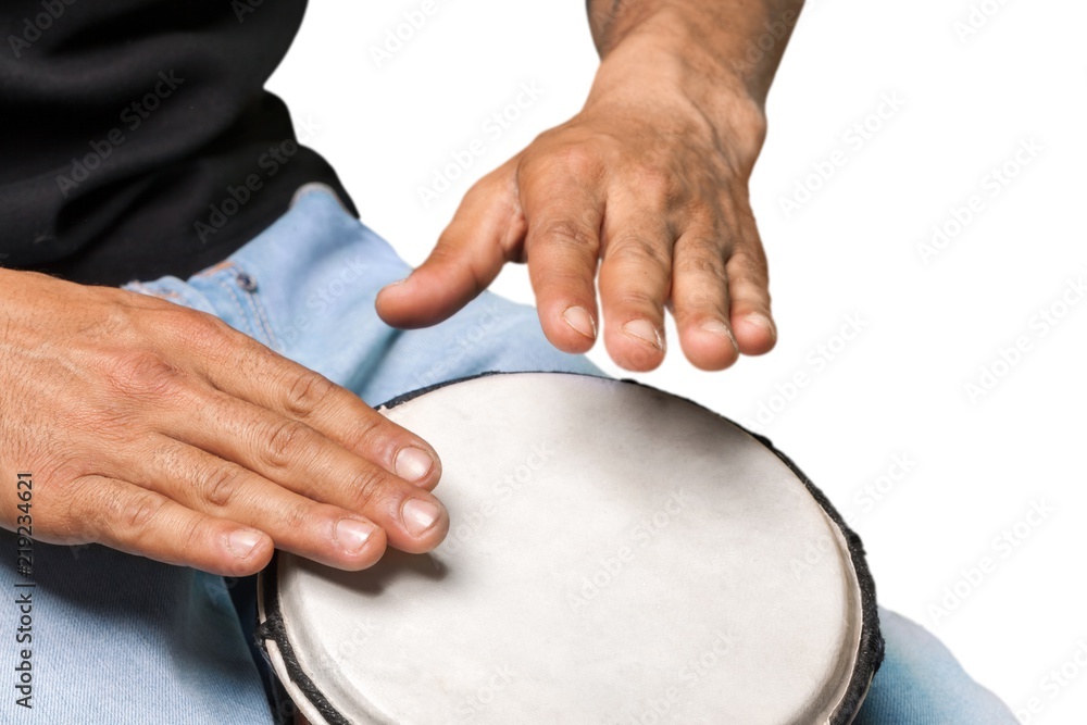 man playing a drum