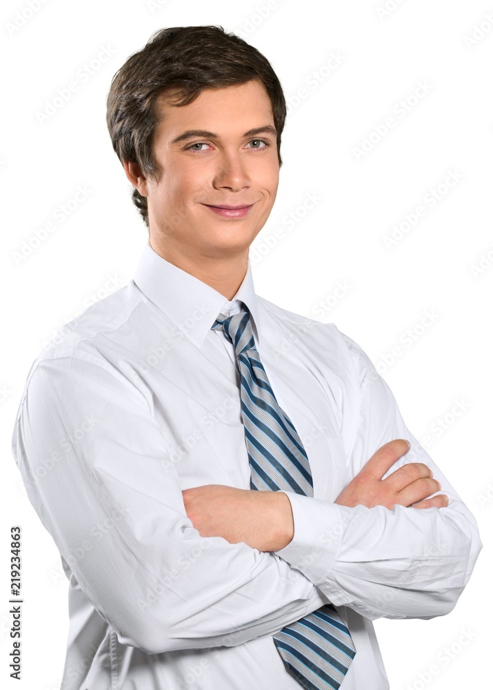 Smiling Businessman Standing with Arms Folded - Isolated Smiling Businessman Standing with Arms Folded - Isolated