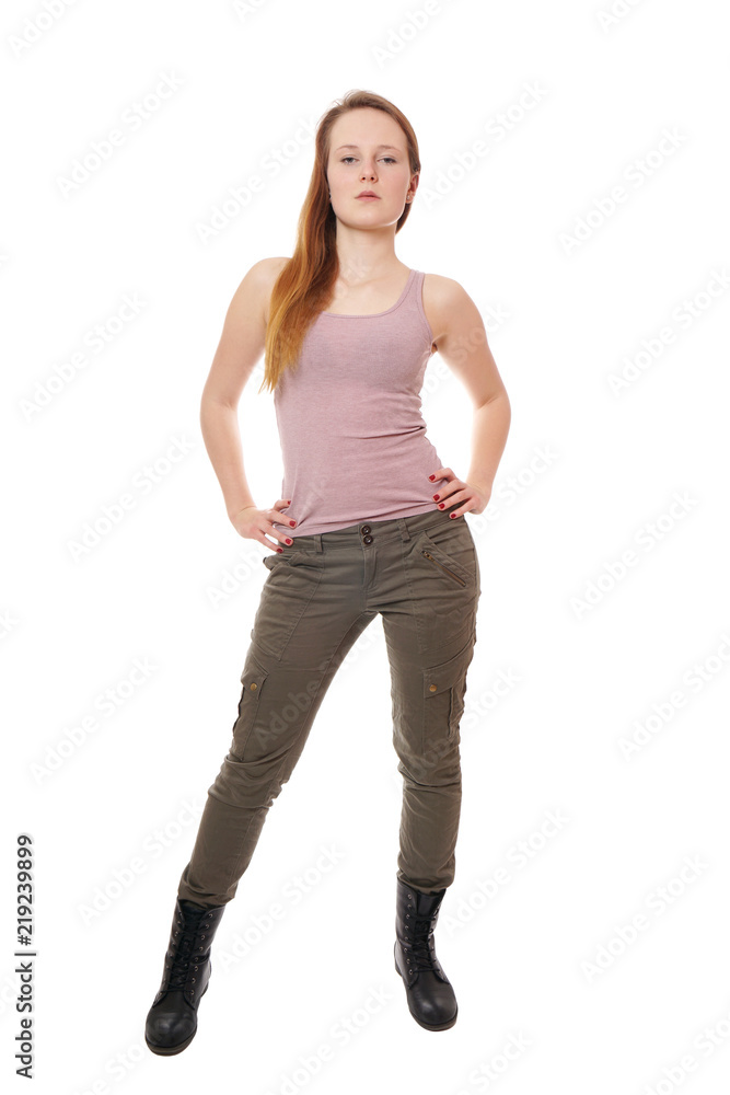young woman wearing tank top, military style khaki pants and boots young woman wearing tank top, military style khaki pants and boots