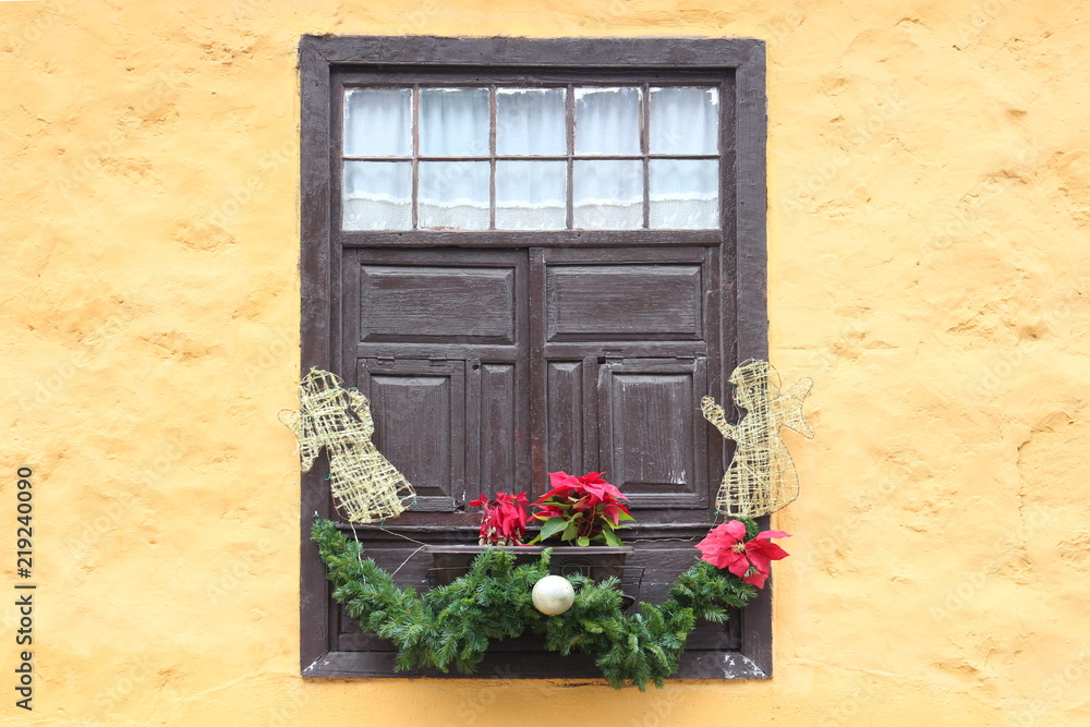 Typical Spanish window with lovely Christmas decoration