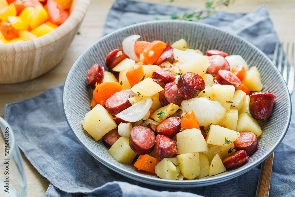 Homemade dish: roasted potato, carrot, onion and sausage. Simply dinner recipe. Homemade dish: roasted potato, carrot, onion and sausage. Simply dinner recipe.