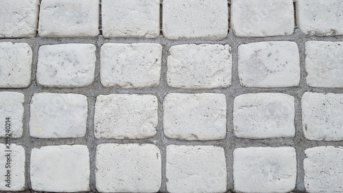 Grey white brick wall texture background rectangular pavers