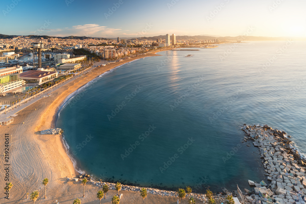 Aerial view of Barcelona Beach in summer morning along seaside in Barcelona, Spain. Mediterranean Sea in Spain.