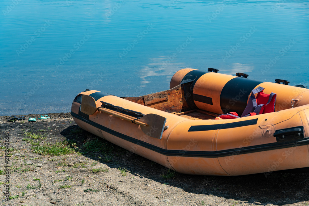 Fototapeta premium Empty rubber dinghy on the beach