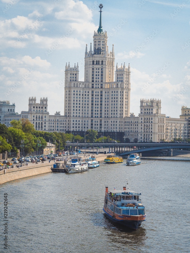 Fototapeta premium Panoramic view from above to Moscow: the road and a lot of cars, Stalin's skyscrapers