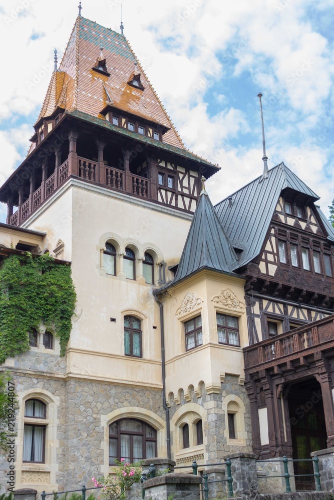 Historic building in Romania. Medieval castle in Europe. Architecture of the Middle Ages. An old house. Luxury estate. An old house. Peles Castle.