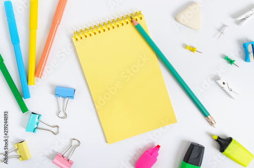 School accessories on a white background. Back to school concept. Office and student supplies. Free space for your project. The top view. Flat lay.