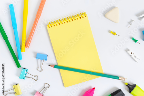 School accessories on a white background. Back to school concept. Office and student supplies. Free space for your project. The top view. Flat lay.